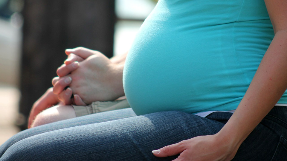 Pregnant mother at approx 32 weeks. Used under CC - http://pixabay.com/en/woman-pregnant-belly-baby-outdoors-358779/